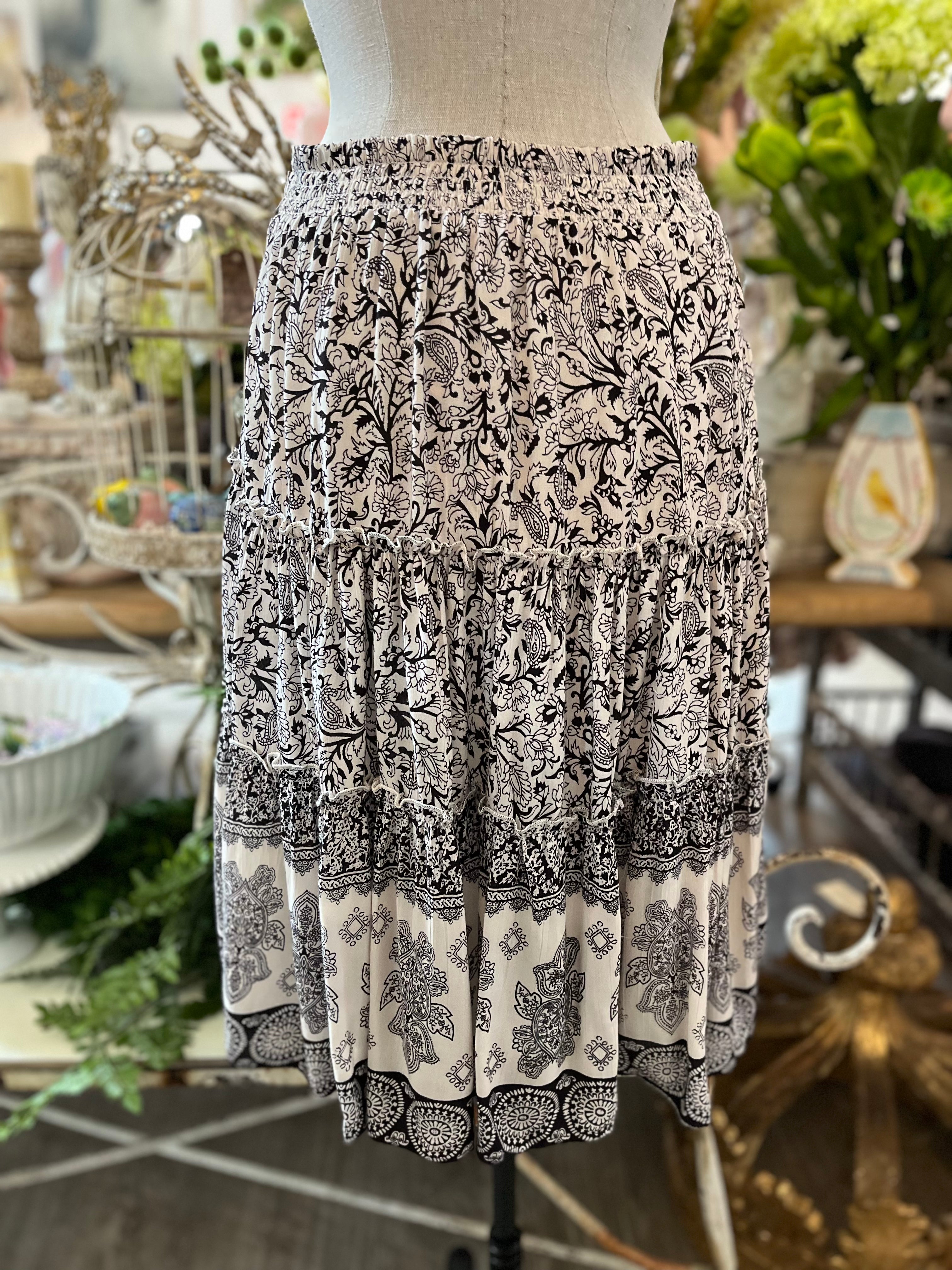 Black ivory border print short skirt